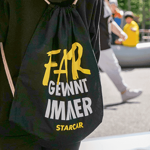 Tragebeutel mit der Aufschrift "Fair gewinnt immer" und Starcar Logo